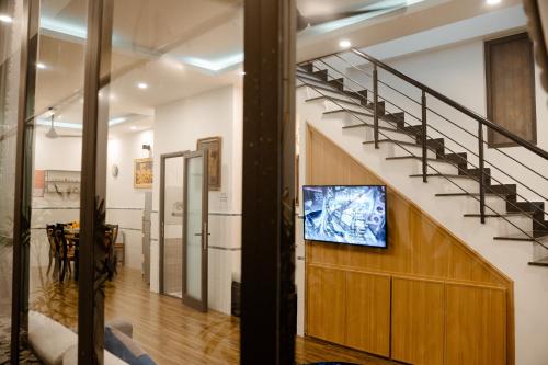 TV a/nebo společenská místnost v ubytování Entire Beach House