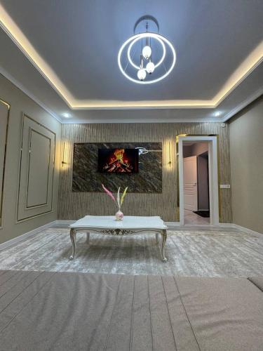 Posezení v ubytování Стильные апартаменты ближе караван сарая