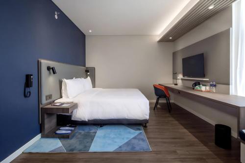Cama o camas de una habitación en Holiday Inn Express Shanghai Hongqiao North by IHG