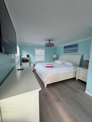 Postel nebo postele na pokoji v ubytování Flamingo Inn