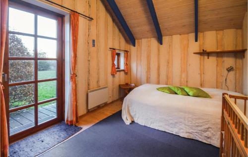 Ένα ή περισσότερα κρεβάτια σε δωμάτιο στο Four-Bedroom Holiday Home In Spottrup