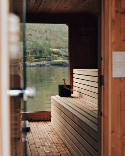 a view from the inside of a boat with a view of the water at Yttervik in Mo i Rana