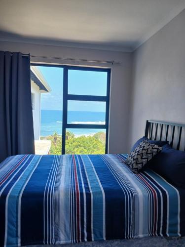 Ένα ή περισσότερα κρεβάτια σε δωμάτιο στο Beach House on Wye rd