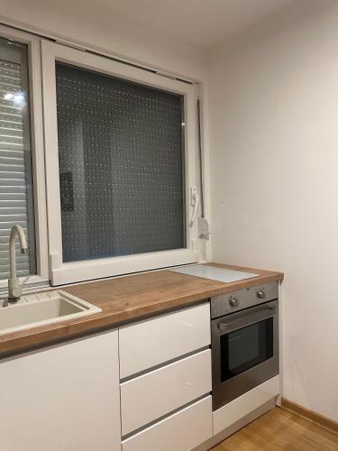 Cozy Apartment 'Nest'にあるキッチンまたは簡易キッチン