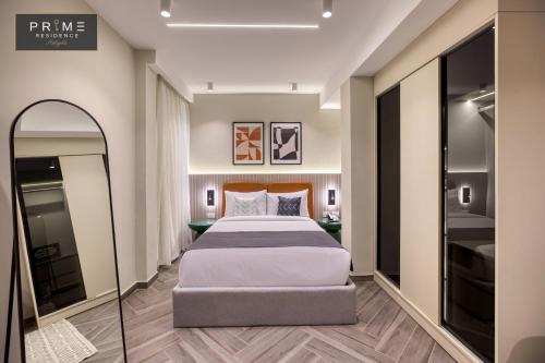 Ένα ή περισσότερα κρεβάτια σε δωμάτιο στο Prime Residence Heliopolis