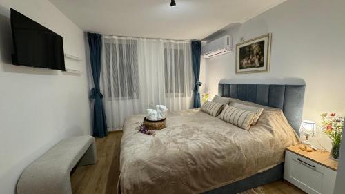 Postel nebo postele na pokoji v ubytování Apartment Tsarevets View