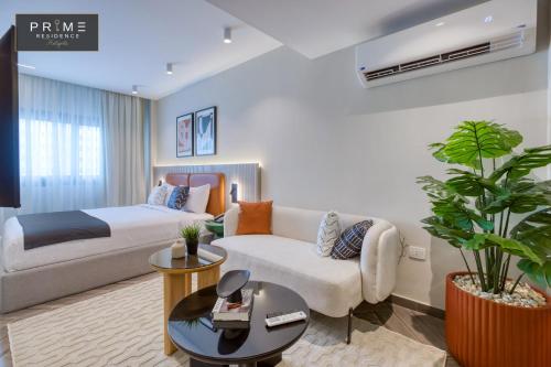Ένα ή περισσότερα κρεβάτια σε δωμάτιο στο Prime Residence Heliopolis
