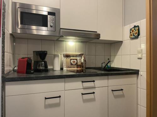 Kuchyň nebo kuchyňský kout v ubytování Ferienwohnung LePetit