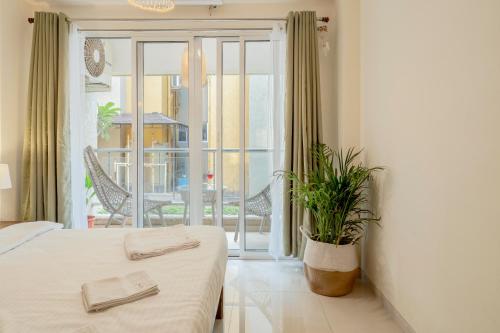 Ένα ή περισσότερα κρεβάτια σε δωμάτιο στο Affcasa Apartments