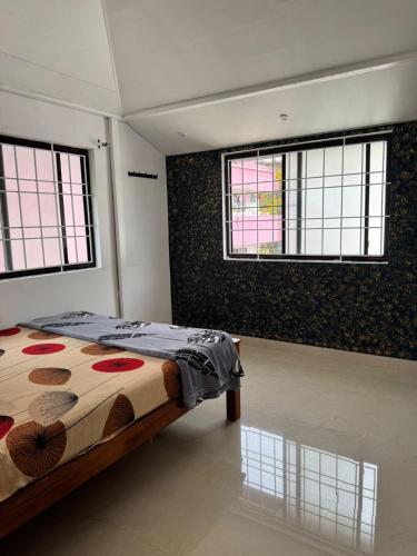 Postel nebo postele na pokoji v ubytování Dream house fort kochi