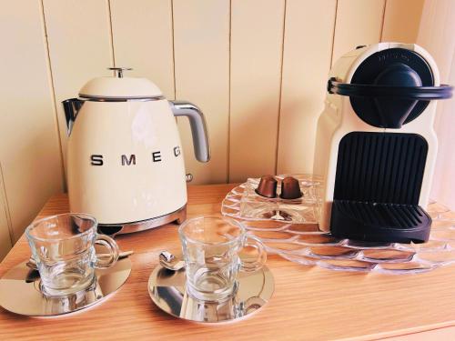 Kemudahan buat kopi dan teh di Home Paradis & Spa