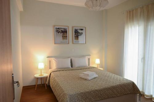 Cama o camas de una habitación en Joanna's Apartments