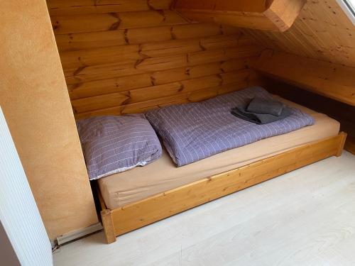 Postel nebo postele na pokoji v ubytování Waldhaus Eichhörnchen