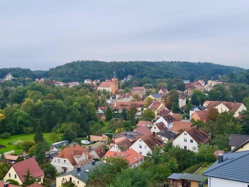 an aerial view of a town with houses at Weitblick Buckow in Buckow