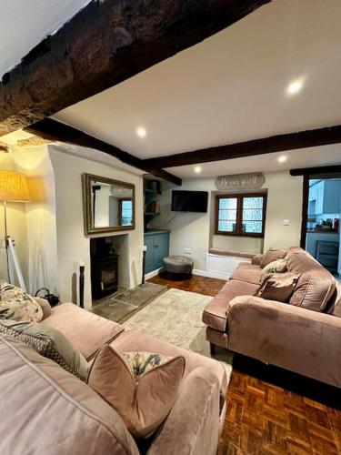 Katil atau katil-katil dalam bilik di Rustic retreat in the Somerset countryside