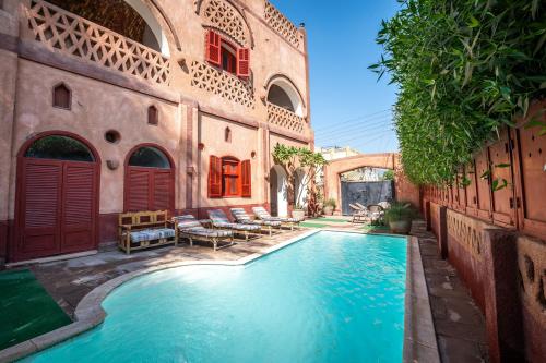 Bazén v ubytování villa al diwan luxor nebo v jeho okolí