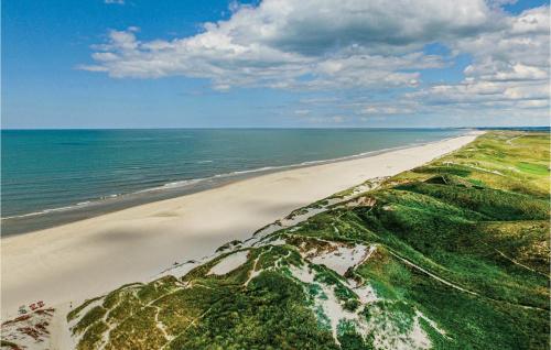 an aerial view of a beach with the ocean at Holiday Home Klægdalen Ringkøbing Denm in Halkær