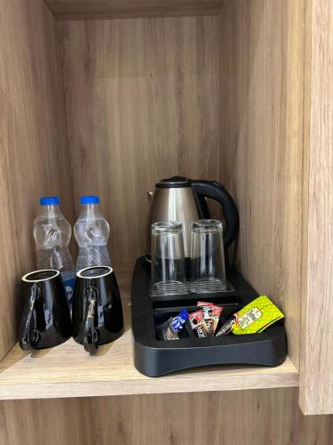 Amber B&B OPP GOLDEN TEMPLEにあるコーヒーまたはお茶