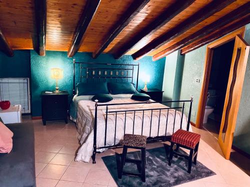Postel nebo postele na pokoji v ubytování Bianca di Navarra House