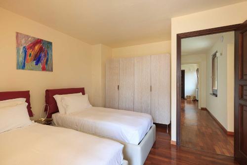 Katil atau katil-katil dalam bilik di Villa Gelsi - Quaint and charming villa with pool!