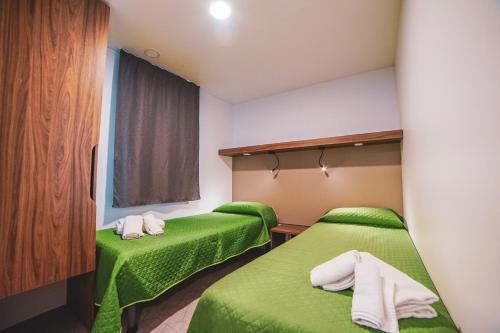 Ein Bett oder Betten in einem Zimmer der Unterkunft Hotel Park