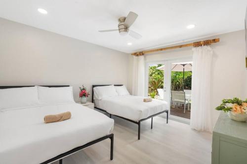 Ένα ή περισσότερα κρεβάτια σε δωμάτιο στο Palm Beach Paradise #833