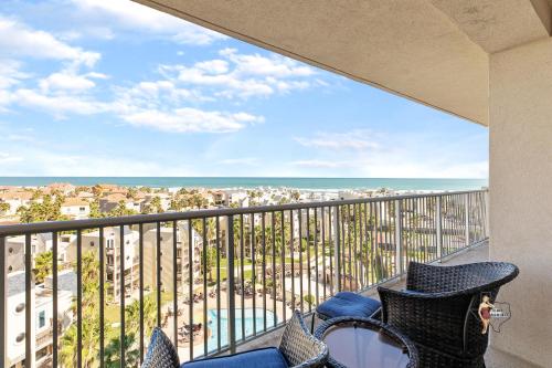 a balcony with chairs and a view of the ocean at Bahia Mar-Solare Tower, Beachfront Resort with Two Pools in South Padre Island