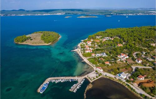 an aerial view of a small island in the water at Villa Tala in Mrljane