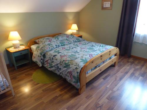 Postel nebo postele na pokoji v ubytování Gîte Du Col Vert