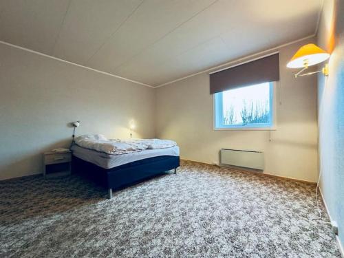 Postel nebo postele na pokoji v ubytování The Yellow House