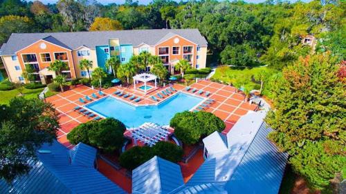 an aerial view of a house with a swimming pool at A cozy place near UF in Gainesville