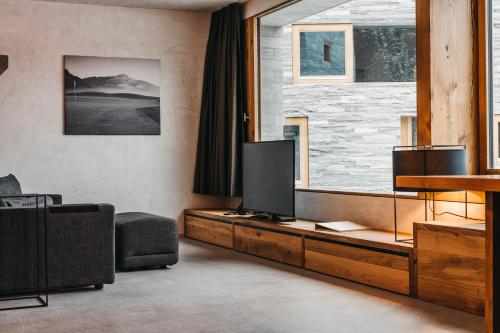Televiisor ja/või meelelahutuskeskus majutusasutuses rocksresort