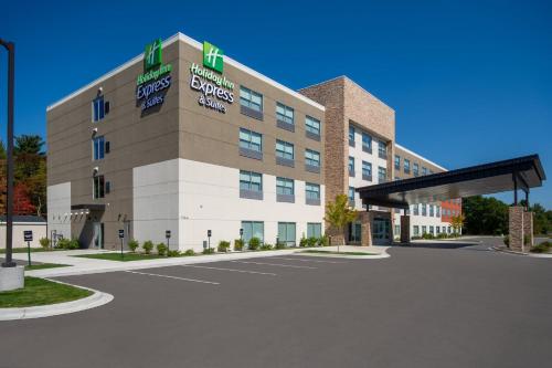 a rendering of the front of a hotel at Holiday Inn Express & Suites Muskegon - Grand Haven by IHG in Muskegon