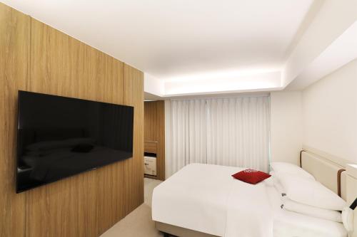 TV a/nebo společenská místnost v ubytování Seoul Inn Hotel by The Designers