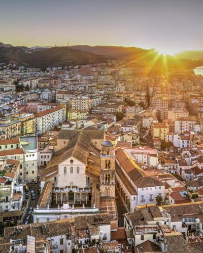 an aerial view of a city at sunset at Salerno Amalfi Coast Home in Salerno