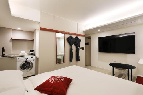 Postel nebo postele na pokoji v ubytování Seoul Inn Hotel by The Designers
