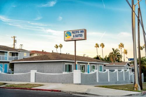 a sign for a marriott inn and suites at Pacific Inn and Suites in San Pedro