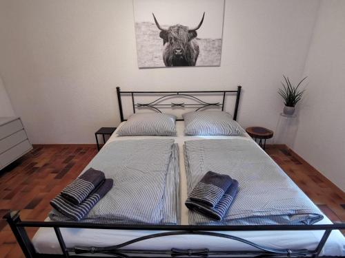 Ένα ή περισσότερα κρεβάτια σε δωμάτιο στο Ferienwohnung Auszeit