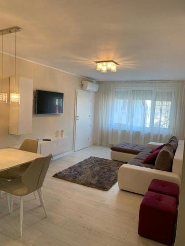 Et tv og/eller underholdning på Ammi - Central Apartment - Galati