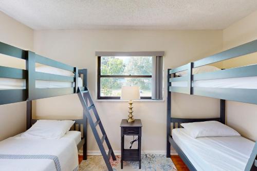 Ένα ή περισσότερα κρεβάτια σε δωμάτιο στο Serenity House