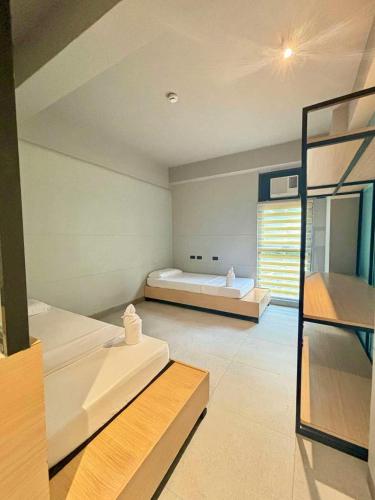Postel nebo postele na pokoji v ubytování Maya Hostel El Nido