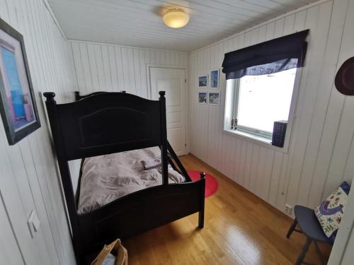 Postel nebo postele na pokoji v ubytování Tromvik Lodge