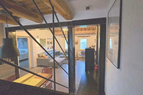 a view of a room with a bedroom and a living room at The Cherry House, Apartamento Monterosa in Petritoli