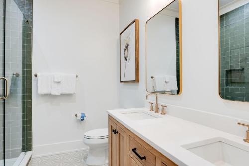 a bathroom with a sink and a toilet and a shower at Shore To Have Fun in Seagrove Beach