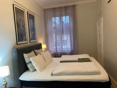 Ένα ή περισσότερα κρεβάτια σε δωμάτιο στο White Star Uppsala City