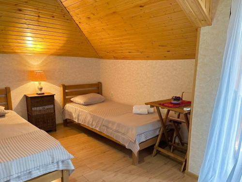 Postel nebo postele na pokoji v ubytování Davit batoni Guest house