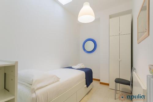 Ένα ή περισσότερα κρεβάτια σε δωμάτιο στο Rest Apartment by Apulia Accommodation