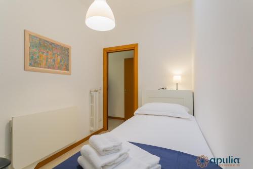 Ένα ή περισσότερα κρεβάτια σε δωμάτιο στο Rest Apartment by Apulia Accommodation
