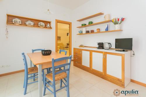 Η κουζίνα ή μικρή κουζίνα στο Rest Apartment by Apulia Accommodation