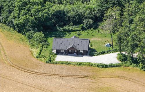an aerial view of a house in a field at Holiday Home Katholm in Ålsrode